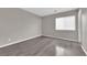Well-lit bedroom with neutral walls and a window providing natural light at 6284 Anticline Ave, Las Vegas, NV 89139