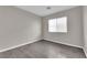 Cozy bedroom with a window and stylish, modern flooring at 6284 Anticline Ave, Las Vegas, NV 89139