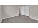 Bedroom featuring modern floors, a window, and double-door closet at 6284 Anticline Ave, Las Vegas, NV 89139