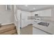 Functional kitchen with white cabinets and standard appliances, ready for home cooking at 6284 Anticline Ave, Las Vegas, NV 89139
