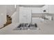 Well-lit kitchen featuring ample countertop space and essential white appliances at 6284 Anticline Ave, Las Vegas, NV 89139