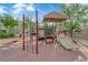 A fun community playground with swings, slides, and climbing area for hours of enjoyment at 6284 Anticline Ave, Las Vegas, NV 89139