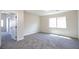 Spacious bedroom with neutral walls and plush carpet, offering a comfortable retreat at 6387 Azurelyn Ave, Las Vegas, NV 89122