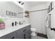 Modern bathroom featuring a sleek vanity, stylish mirror, and contemporary fixtures at 6688 Martinsville Pl, Las Vegas, NV 89110