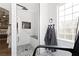 Bright bathroom featuring a walk-in shower with white subway tile and a stone pebble floor at 6688 Martinsville Pl, Las Vegas, NV 89110