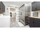 Spacious laundry room features plenty of counter space, storage, and stainless steel appliances at 6688 Martinsville Pl, Las Vegas, NV 89110