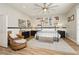 Vaulted ceiling above a main bedroom showcasing wood-look floors, decor and a ceiling fan at 6688 Martinsville Pl, Las Vegas, NV 89110