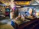 Extravagant living area with custom ceiling art, gothic decor, and unique decorative touches at 709 Evergreen Cir, Las Vegas, NV 89107