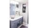 Stylish bathroom with vanity, decorative mirror, and soft grey color palette at 7607 Boca Raton Dr, Las Vegas, NV 89113