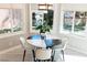 Breakfast nook with round table surrounded by bright windows at 7607 Boca Raton Dr, Las Vegas, NV 89113