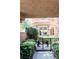 View of decorative wrought iron security gate and walkway leading to the front of the house at 7607 Boca Raton Dr, Las Vegas, NV 89113