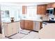 Bright and airy kitchen with stainless steel appliances, center island, and ample counter space at 7607 Boca Raton Dr, Las Vegas, NV 89113