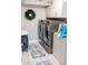 Well-equipped laundry room featuring modern machines, a practical layout, and storage, optimizing laundry tasks at 7607 Boca Raton Dr, Las Vegas, NV 89113