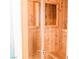 Relaxing wooden sauna with a glass door showcasing the interior details at 7607 Boca Raton Dr, Las Vegas, NV 89113