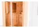 Beautifully crafted wooden sauna with seating and a small bucket on a shelf at 7607 Boca Raton Dr, Las Vegas, NV 89113