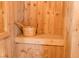 Well-maintained wooden sauna with a bucket, ladle, and bench seating at 7607 Boca Raton Dr, Las Vegas, NV 89113