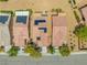 Aerial view of houses with solar panels on tile roofs, showcasing modern, energy-efficient homes at 7669 Fieldfare Dr, North Las Vegas, NV 89084