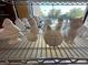 Close-up of unpainted ceramic crafts, including animals and holiday themes at 7669 Fieldfare Dr, North Las Vegas, NV 89084