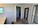 Bathroom features a vanity, mirror, and small ottoman seat at 7704 Classy Cashmere Ct, Las Vegas, NV 89149