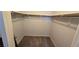 Empty walk-in closet with carpeting and closet rod ready for storage at 7704 Classy Cashmere Ct, Las Vegas, NV 89149