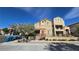 Inviting two-story home featuring a landscaped yard and convenient street parking at 7704 Classy Cashmere Ct, Las Vegas, NV 89149