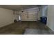 Spacious two-car garage with an automatic door, ample room for vehicles, and some storage at 7704 Classy Cashmere Ct, Las Vegas, NV 89149