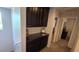 Hallway with upper level built-in cabinetry and storage space at 7704 Classy Cashmere Ct, Las Vegas, NV 89149