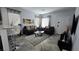 Inviting living room with comfortable seating and lots of natural light throughout at 7704 Classy Cashmere Ct, Las Vegas, NV 89149
