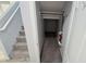 Under stairs storage area with carpeting, shelving, and room for organizational needs at 7704 Classy Cashmere Ct, Las Vegas, NV 89149