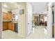 Spacious kitchen features wood cabinets, granite countertops, and stainless steel appliances at 7724 Somerhill Point Way, Las Vegas, NV 89139