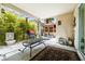 Back patio with a grill and seating at 7724 Somerhill Point Way, Las Vegas, NV 89139