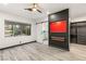 Main bedroom features a sleek fireplace, custom walk-in closet and outdoor views at 9029 Rivers Edge Dr, Las Vegas, NV 89117