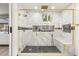 Luxurious shower showcasing marble walls, gold fixtures, and a built-in bench at 9029 Rivers Edge Dr, Las Vegas, NV 89117