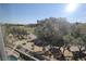 Picturesque view from the backyard showcasing a verdant golf course and mature trees at 912 Pro Players Dr, Las Vegas, NV 89134