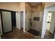 Modern bathroom showcasing a glass-enclosed shower with stylish tile and dark fixtures at 912 Pro Players Dr, Las Vegas, NV 89134