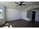 Bright, spacious bedroom with hardwood floors and contemporary lighting, perfect for relaxation and rest at 912 Pro Players Dr, Las Vegas, NV 89134