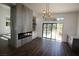 Bright dining room with fireplace and a view of the backyard pool at 912 Pro Players Dr, Las Vegas, NV 89134