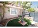 Beautifully landscaped front yard featuring a charming fountain and vibrant green lawn at 912 Pro Players Dr, Las Vegas, NV 89134