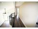 This upstairs hallway has views to the great room and lots of natural light at 912 Pro Players Dr, Las Vegas, NV 89134