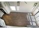 Open floor plan with hardwood floors, a fireplace, multiple windows and skylights at 912 Pro Players Dr, Las Vegas, NV 89134