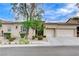 Charming single-story home featuring a well-manicured yard and a two-car garage at 9349 Olympia Falls Ave, Las Vegas, NV 89149