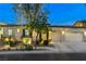 Charming home with a well-maintained lawn, mature trees, and a welcoming facade at 9349 Olympia Falls Ave, Las Vegas, NV 89149