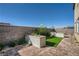 This backyard features pavers, low walls, landscaping, and partial mountain views at 9564 Archer Peak Ct, Las Vegas, NV 89143