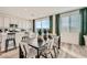 Inviting dining area with stylish table and chairs, complemented by contemporary decor and ample natural light at 9564 Archer Peak Ct, Las Vegas, NV 89143