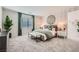 Serene bedroom with patterned wallpaper, and king bed and bench, and leafy accents at 9564 Archer Peak Ct, Las Vegas, NV 89143