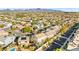 An elevated view of single-Gathering homes and community amenities, including pools and green spaces at 977 Courtney Valley St, Henderson, NV 89052