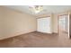 Spacious bedroom features a ceiling fan and a closet at 977 Courtney Valley St, Henderson, NV 89052