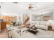 Bright and airy living space featuring a seamless flow to the kitchen and dining area at 977 Courtney Valley St, Henderson, NV 89052