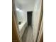 Hallway bathroom with double sink vanity and access to a full tub and shower at 9821 Sedona Shrine Ave, Las Vegas, NV 89148