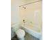 Cozy bathroom featuring a standard white tub with shower and modern toilet at 9821 Sedona Shrine Ave, Las Vegas, NV 89148